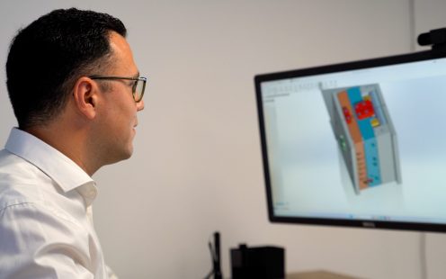 Pipelife's Head of R&D, Konstantinos Akritanakis, working with a digital simulation software.