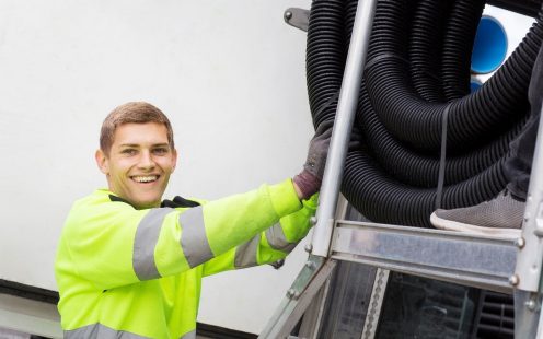 Employee working on pipes