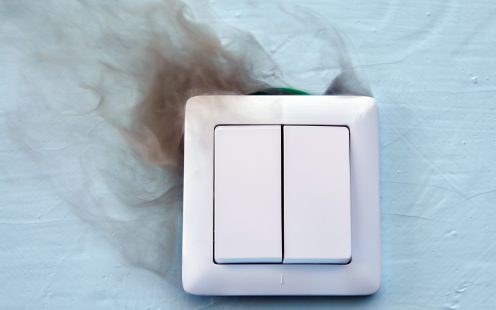 Electrical fires are a major cause of fires in the home. Smoke and burn marks on electric light switch.