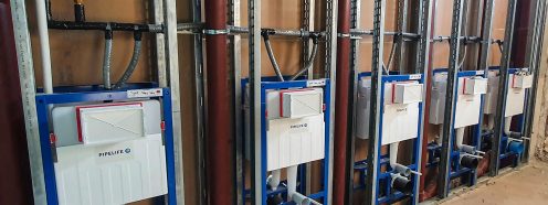 Toilet cisterns and frames