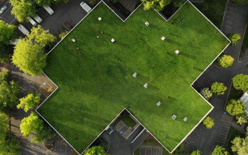 Photo of the roof of a large house and the landscape top view, texture for design