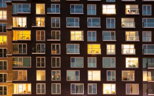 Modern apartment block at dusk themes of urban scene apartment housing