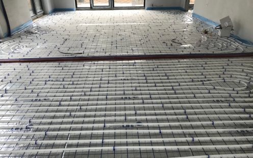 A room with hydronic underfloor system installed | Pipelife