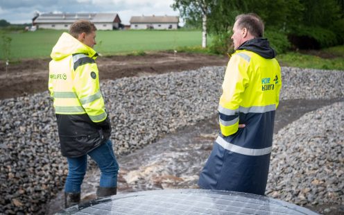 Experts from Pipelife and Kone-Kovera Oy standing next to the fishway shortly before its opening | Pipelife