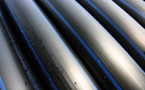 A row of PE 100 RC potable water supply pipes | Pipelife