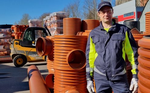 Maris standing next to welded wells and gullies | Pipelife