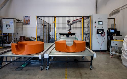 Two completed 3D-printed flow profiles on a conveyer belt | Pipelife