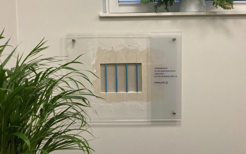 A small fragment of uncovered wall heating panel at Pipelife Poland's office has been left to showcase the system to the clients | Pipelife