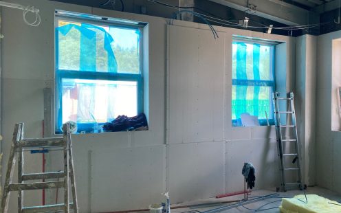 The meeting room during renovations with some wall heating panels already installed | Pipelife