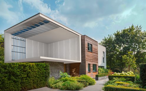 A 3D visualization showing a radiant ceiling cooling and wall heating systems installed in a family house.