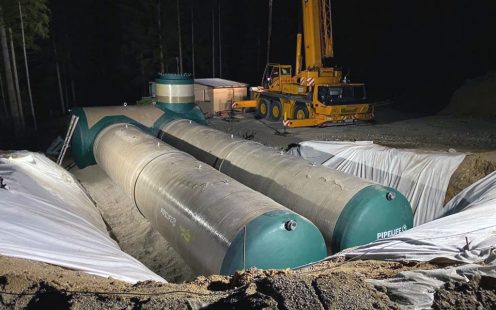 drinking water storage tank laying in headlights