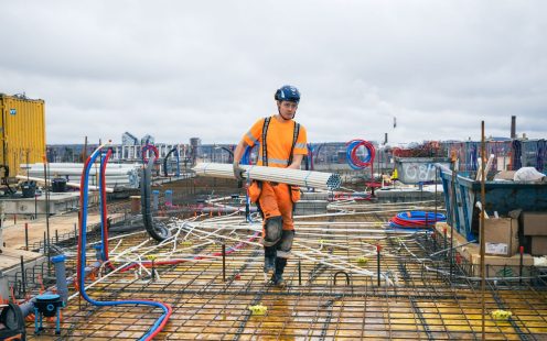 Installer is laying cable conduits through the floors at one of the Ranta-Tampella new builds | Pipelife