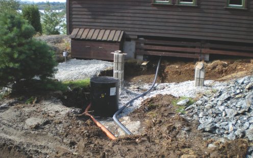 Two Isoterm pipes connected to a log cabin in Norway | Pipelife