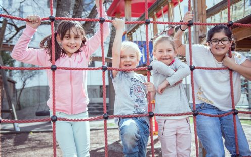 Four children playing outdoors at a SOS Kinderdorf village in Austria | Pipelife