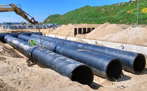 A rainwater retention system is under construction for a new production site in Gromadka, Poland