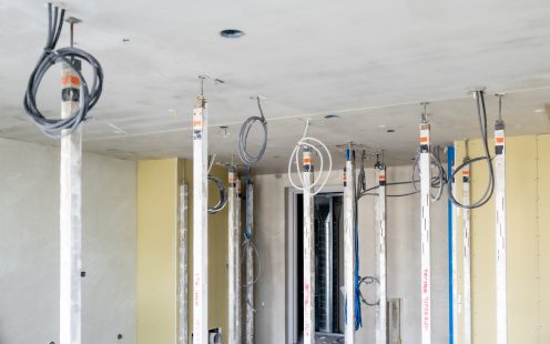A wide-shot of Pipelife's Spider prefabricated system installed throughout an apartment.