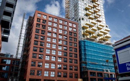 The facade of the 11-floor Coral tower at SPOT Amsterdam residential complex.