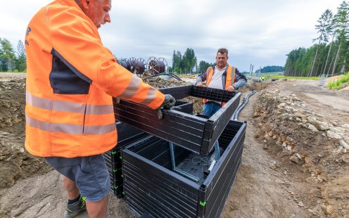 Construction workers building a cable duct chamber