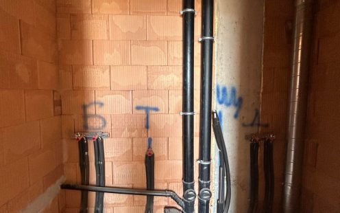 Close-up view of a reel of cable protection pipes